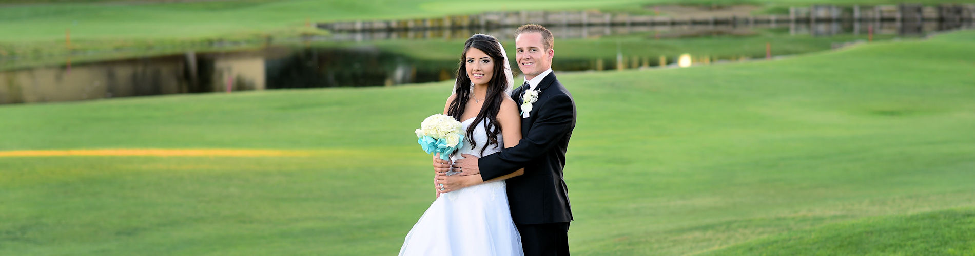Bride and groom on the Bartley Cavanaugh fairway